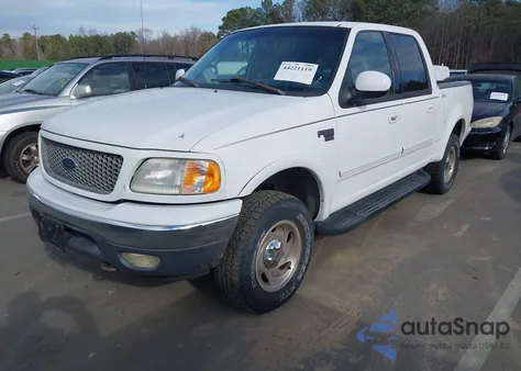 2001 Ford F-150 King Ranch Edition/Lariat/Xlt z USA, uszkodzony, nr VIN 1FTRW08LX1KD63352